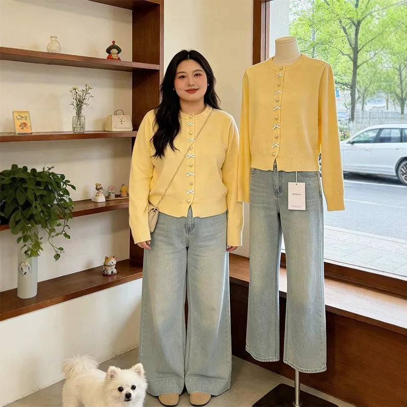 Plus-size women's cream-colored bow-knot knitted cardigan, new 2026 spring style, casual and youthful sweater coat Plus-size women's cream-colored bow-knot knitted cardigan, new 2026 spring style, casual and youthful sweater coat