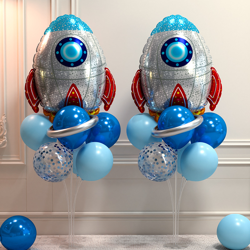 Children's little boy's 10th birthday party decoration scene layout rocket plane balloon table floating on the ground