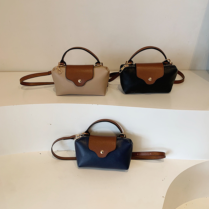 Nueva moda de ocio y moda 2025 simple Pu mujeres de color sólido bolso cuadrado de mano bajo la axila