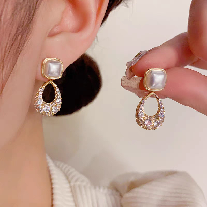 Elegant square earrings from pearl with zircon drop-shaped