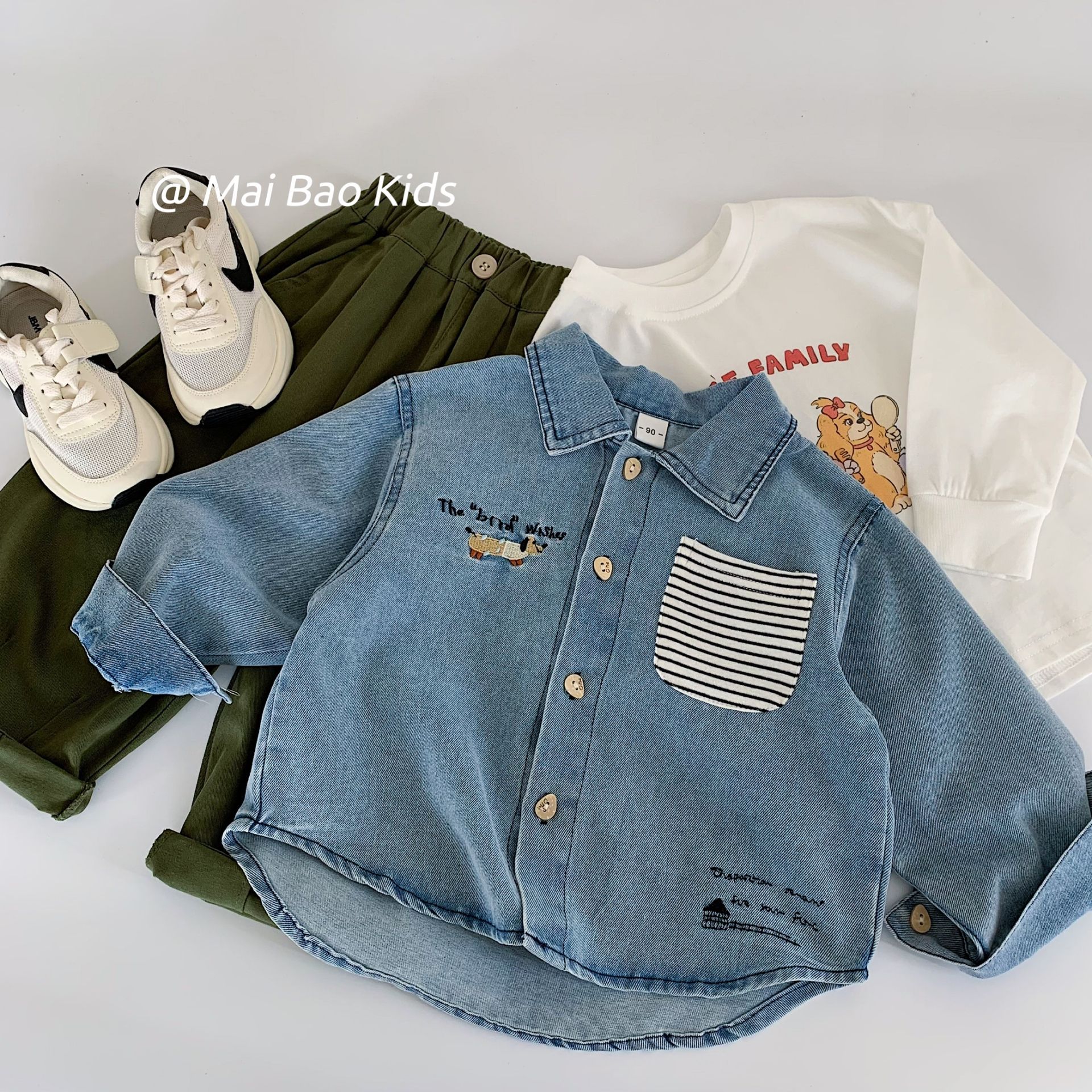 Mai Bao camisa de vaquero para niños 2025 otoño nuevo estilo coreano camisa de dibujos animados para niños Huzhou ropa de tela para niños