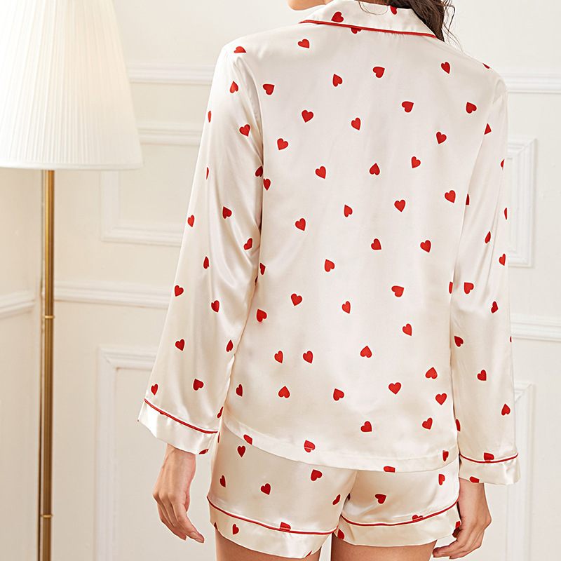 Conjunto de dos piezas de pijama de seda sintética con estampado de corazón para mujer, estilo nuevo de primavera, de manga larga, se puede usar fuera de casa