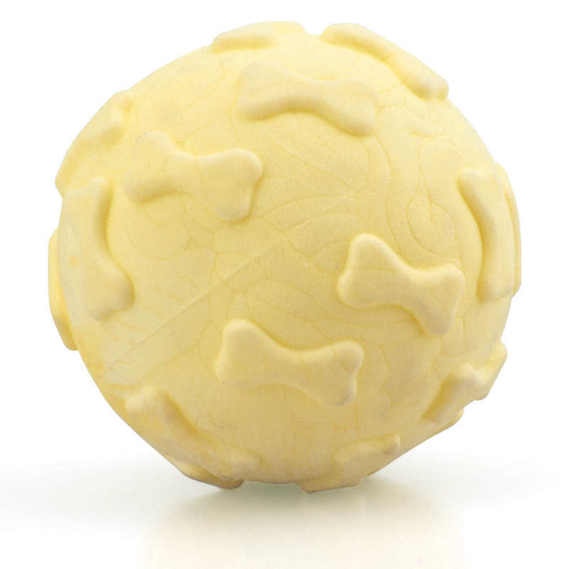 Juguete para mascotas transfronterizo TPR Bola de hueso de espuma mordedura molar sabor a leche bola sólida fábrica de juguetes para perros