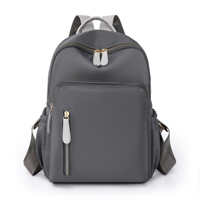 2023 nueva mochila casual para mujer de nailon moda salvaje viaje urbano mochila pequeña mochila escolar ligera al por mayor