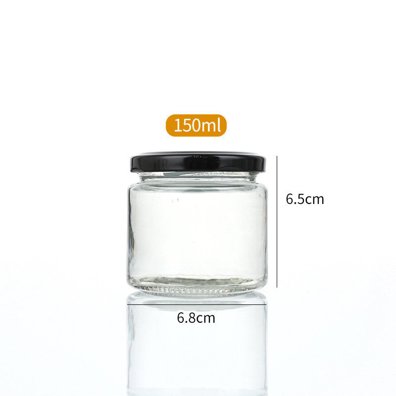 Botella de salsa redonda resistente a altas temperaturas sellada transparente resistente a altas temperaturas botella de melocotón amarillo enlatada botella de miel frutas botella de vidrio spot
