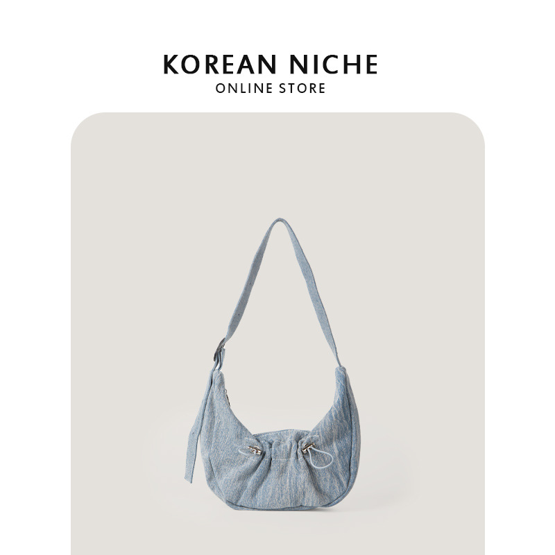 Bolsa de diseño de nicho Klein azul Denim bolsa de hombro de primavera y verano nueva bolsa de las axilas de alto sentido todo-fósforo bolso