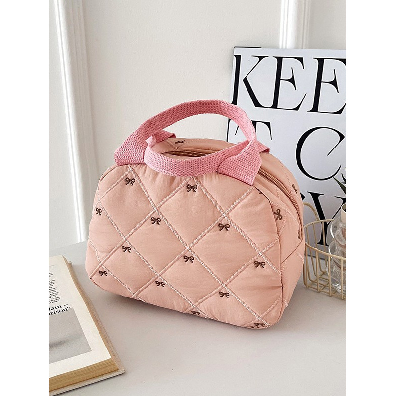 capacious shoulder bag with bow