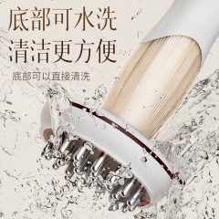 瑞初電気経絡ブラシマッサージ全身通用筋絡ブラシ足掻き器でお腹の背中の神器を揉みます。