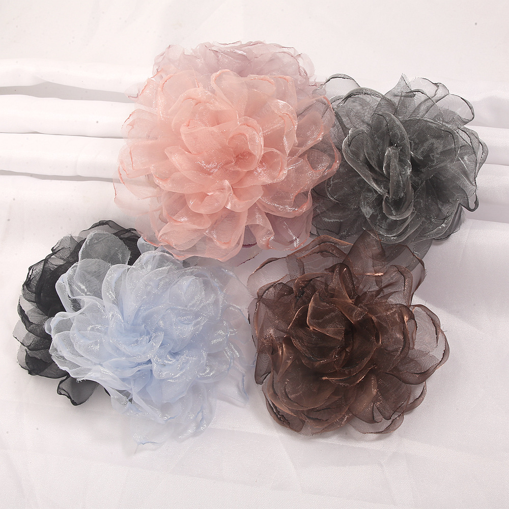 Korean-style new 3D fabric flower accessories for clothing, including hair clips, DIY brooches, head ornaments, and shoe embellishments, available for wholesale