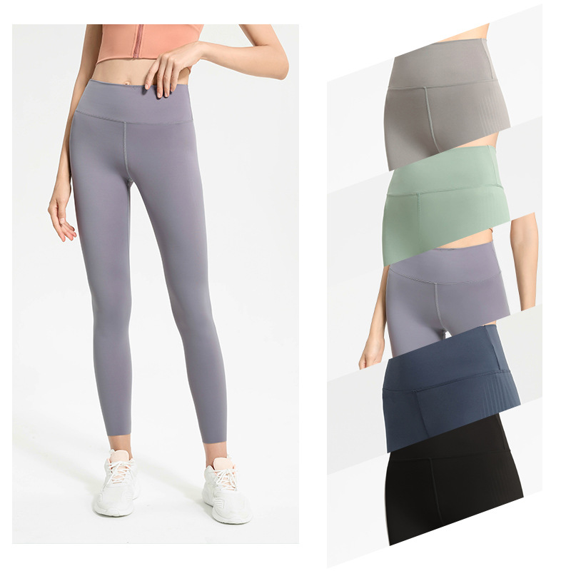 Nuevos pantalones de yoga europeos y americanos de cintura alta de las mujeres de levantamiento de cadera polainas deportivas pantalones de fitness Peach Hip apretado pierna delgada adelgazante pantalones de correr