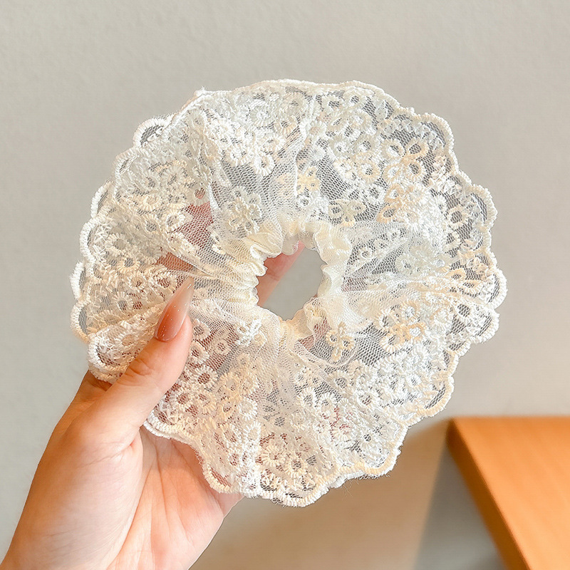 Pastoral viento intestino anillo de cabello mujer 2025 nuevo estilo de alta sensación bola de cabello cuerda de cabeza flor dulce princesa adornos de cabello cuerda