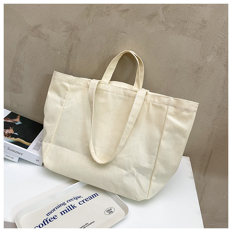 A large-capacity, sturdy Japanese-style canvas bag for women, a new 2022 simple bento handbag for girls to go to work undefined