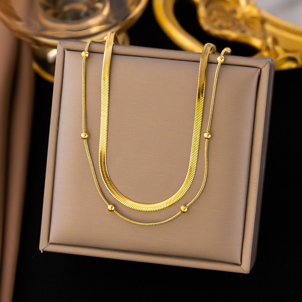 Collar al por mayor transfronterizo de las mujeres que no se desvanece elegante de lujo exquisito Acero de titanio nuevo nicho de las mujeres cadena de la clavícula de la moda del todo fósforo