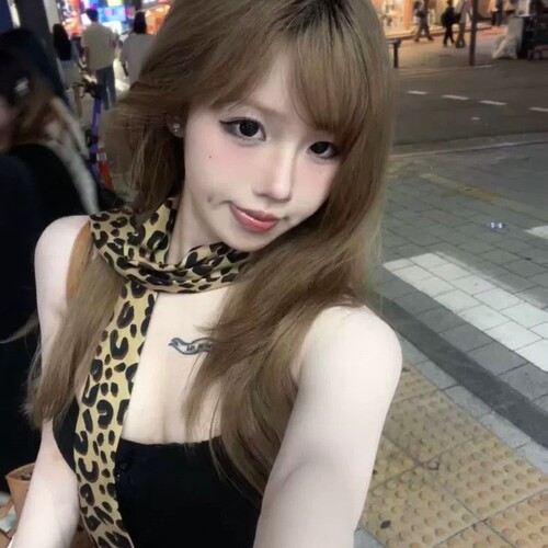 Elevated, versatile leopard and polka-dot silk scarf: a retro, edgy 