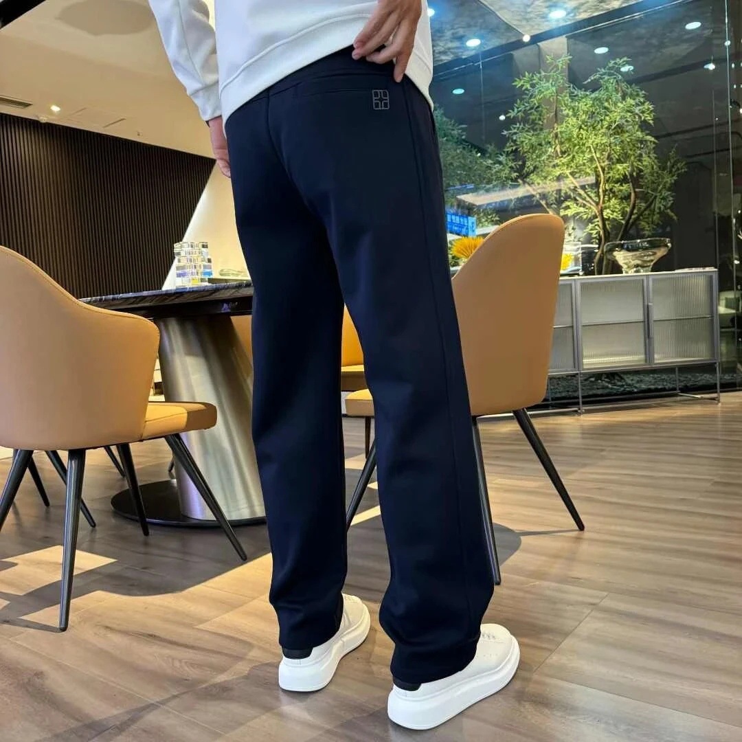 Primavera y otoño pantalones juveniles para hombres 2025 nuevos pantalones casuales rectos sueltos otoño y invierno con pantalones deportivos de lana
