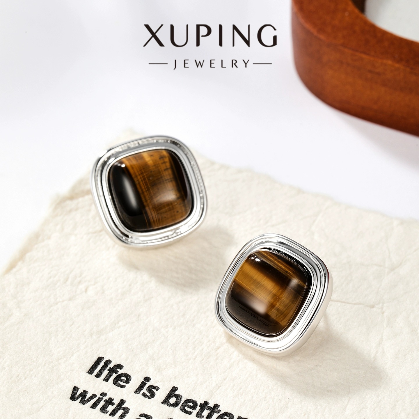 Xuping geometría cuadrada mirad imitación de piedra de ojo de tigre simple nicho de alta sensación otoño invierno auriculares al por mayor