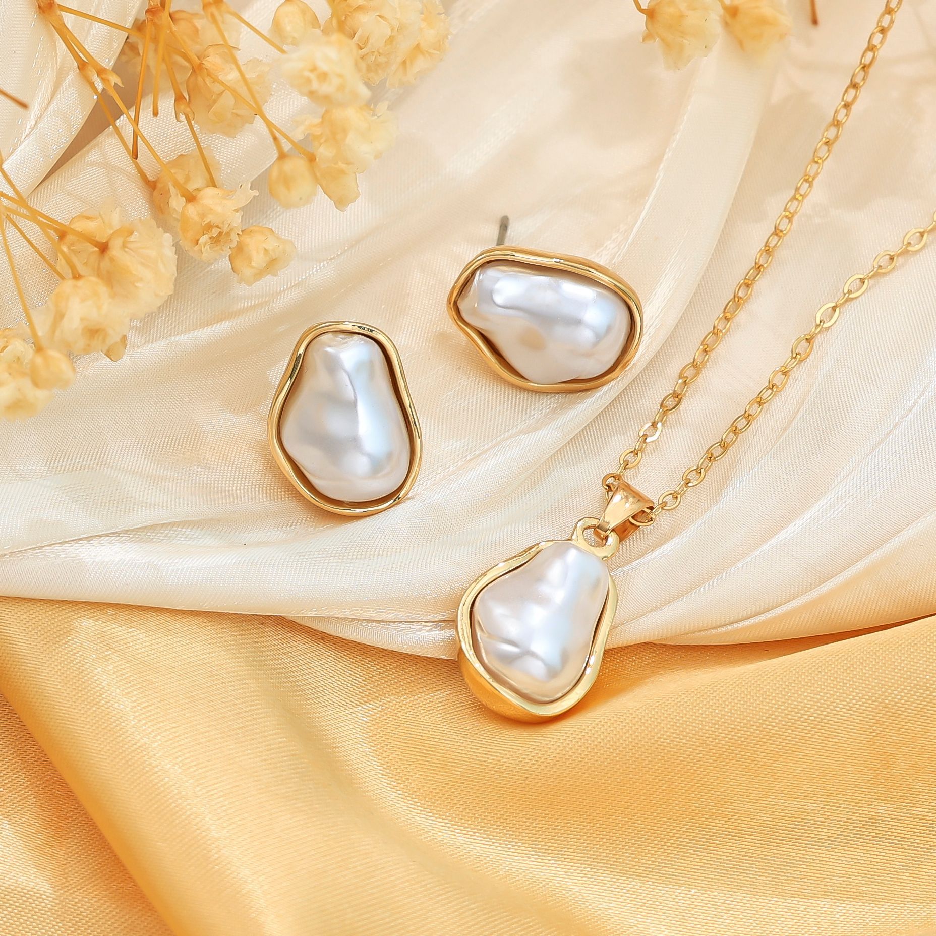 Venta caliente transfronteriza europea y americana, conjunto de anillos de collar, pendientes de moda de perlas del sexo opuesto, pendientes de mujer de alta calidad
