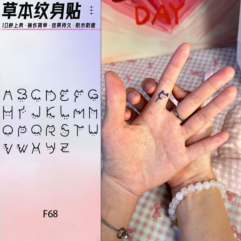 Cute cat ear-shaped English letter herbal tattoo stickers, ins niche small pattern stickers for finger joints Cute cat ear-shaped English letter herbal tattoo stickers, ins niche small pattern stickers for finger joints