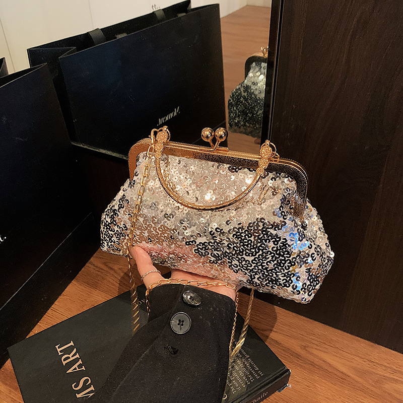 Europa y los Estados Unidos bolso de cena de sequillas mujeres 2025 primavera nuevo bolso de mano bolso de hombro de moda bolso de cadena de corte