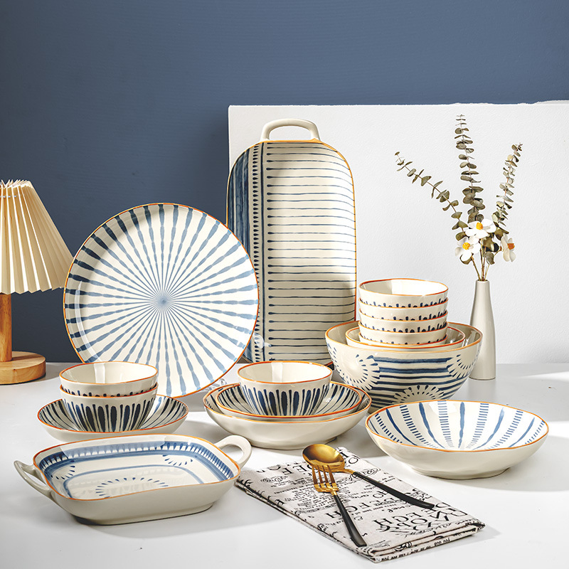 Tacos de arroz de color esmaltados japoneses domésticos 2025 nuevos platos de cerámica de alto valor de superficie platos de platos de alta calidad