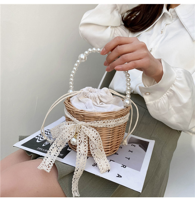 Fashion Round Straw Pearl Portable Bag display picture 45