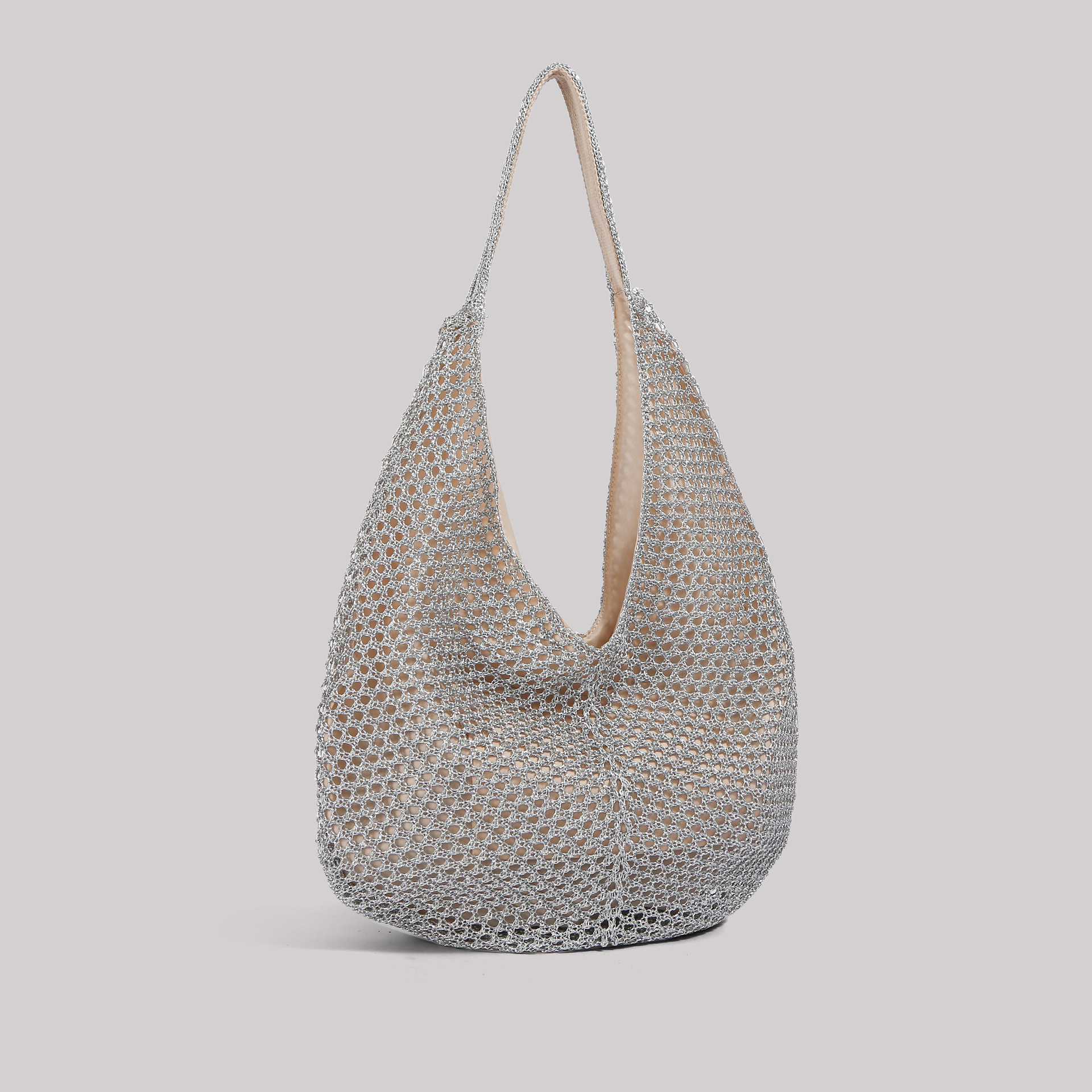 Bolsas de brazo retro coreanas diarias trenzadas mujeres verano 2026 gran capacidad de moda universal agujerado bolsas de hombro de moda