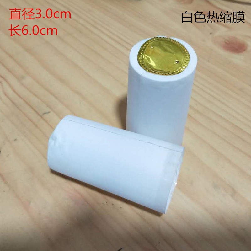 PVC tapa de plástico botella de vino rojo película de sellado cable de tracción fácil película Termocontraíble botella de vino de vidrio película de encogimiento en stock al por mayor