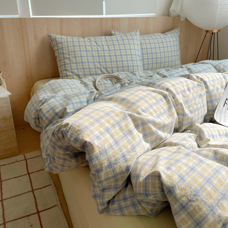 Una clase de algodón cuatro piezas de tejido de agua lavado sábanas de algodón cubierta dormitorio de estudiantes cama de tres piezas de impresión y teñido activo