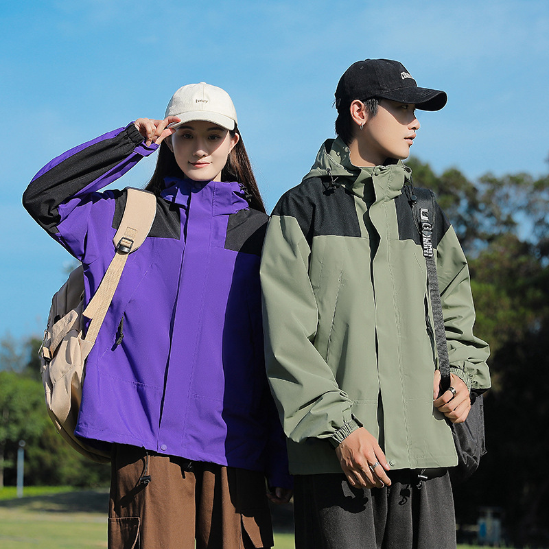 Primavera y otoño deportes al aire libre pareja de moda casual sombrero desmontable color a juego hombres y mujeres chaqueta delgada entrega en vivo
