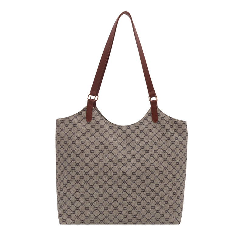 Bolso de gran capacidad de Europa y los Estados Unidos, bolso de personalidad de viaje femenino, bolso de 2025 nuevo estilo de bolso de hombro de tendencia estética, bolso de textura femenina