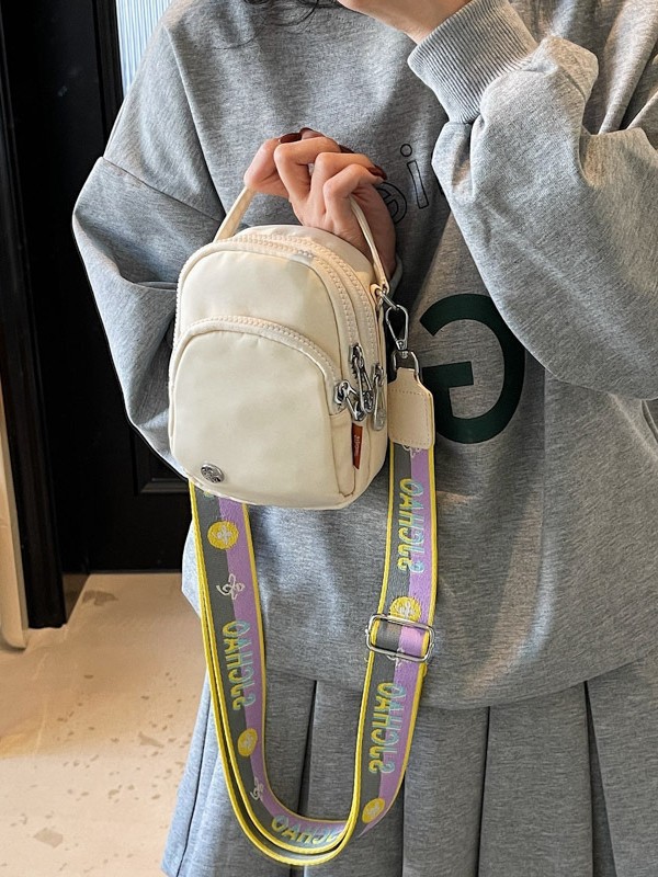 Nuevo bolso cuadrado pequeño portátil de moda coreana transfronterizo, bolso femenino, bolso de mensajero de un solo hombro ligero de color de contraste de tela Oxford de alta gama