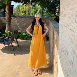 黄色吊带连衣裙女装夏季宽松显瘦流苏长裙海边度假风a字裙子