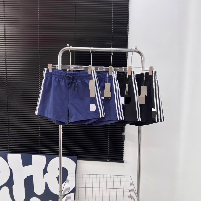 Ad Adidas Women's Three-Stripe Woven Shorts. Order Number: Qianjing0088