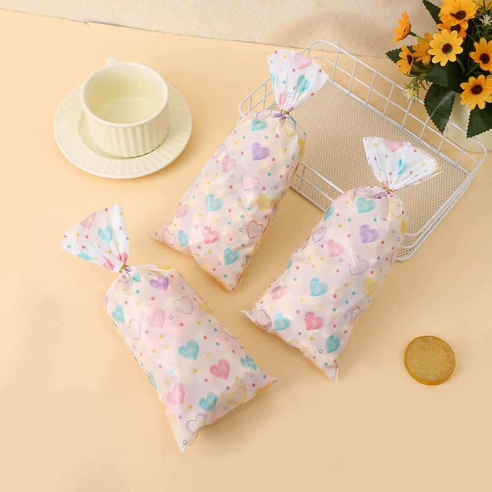 Bolsa de embalaje de dulces OPP serie de bolsillo plano de San Valentín amor impresión en color chica bolsa de corazón bolsa de embalaje de algodón de azúcar