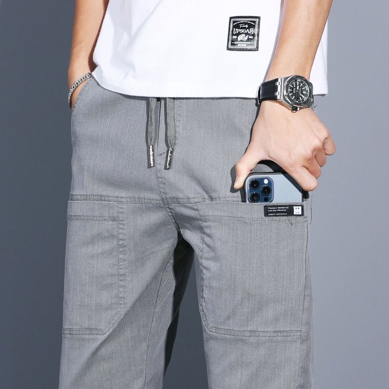 Pantalones casuales transfronterizos de primavera y otoño para hombres 2025, nuevos pantalones rectos elásticos de cintura larga sueltos, ropa de negocios de tendencia para hombres