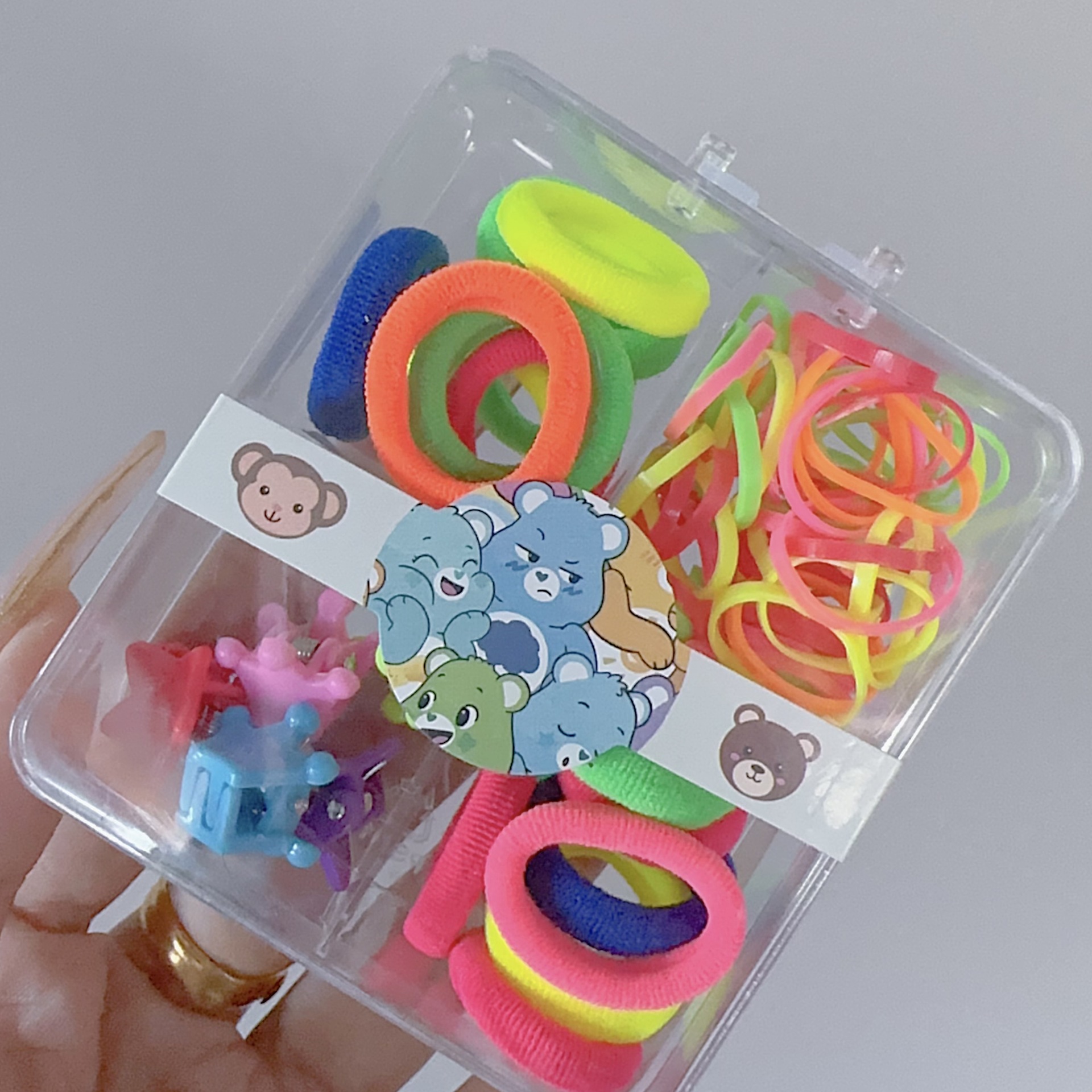 Al por mayor 2.5 pulgadas pulgar pequeño anillo de cabello nuevo niño no lesiones de cabello correa de color caja de chaqueta de cabello pequeña personalidad encantadora