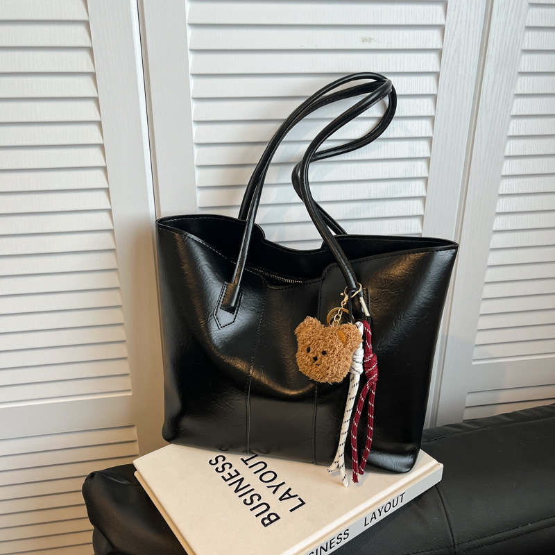 Bolso de gran capacidad de viajero de temperamento de alta gama para mujer 2024 nuevo otoño e invierno bolso de hombro de lujo ligero bolso de ocio