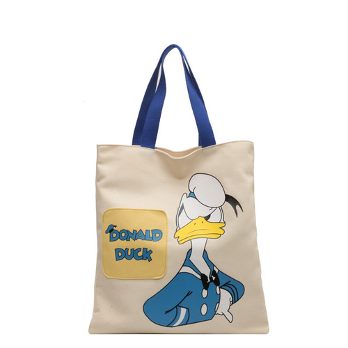 Original niche canvas bag for women, new cartoon Donald Duck hand-held tote bag for college students, reading single-shoulder cross-border