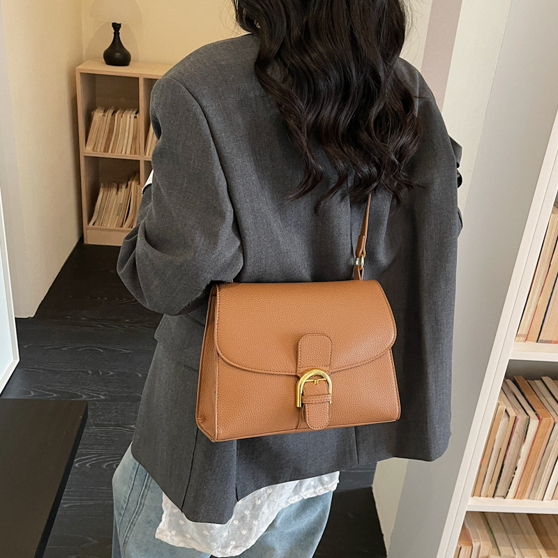 Retro nicho de diseño bolso pequeño para mujeres 2026 nuevo mochila de textura de moda simple mochila de viaje diario