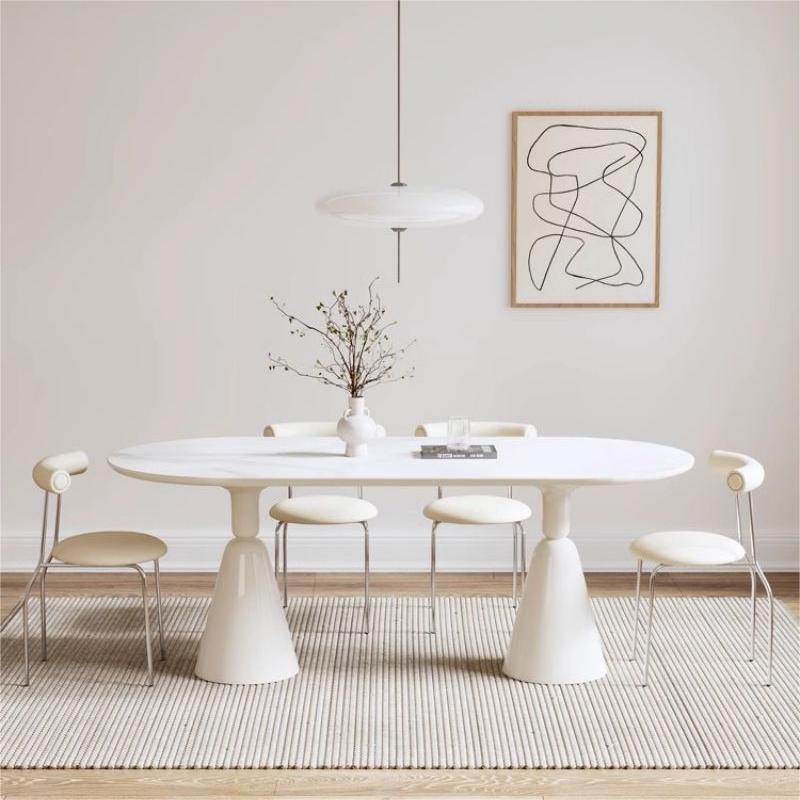 Mesa de comedor de tabla de roca ovalada de estilo de crema de estilo medieval para casa pequeña combinación de mesa de comedor de estilo francés de lujo ligero