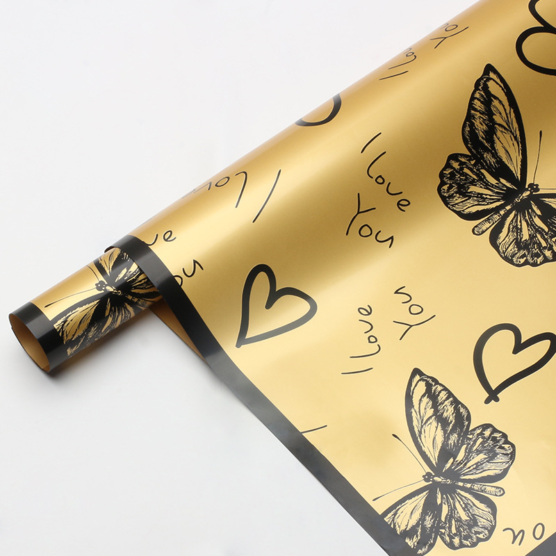 Flor Xi mariposa amado marco de papel de embalaje de flores OPP película impermeable DIY regalo ramo de flores papel de embalaje de flores