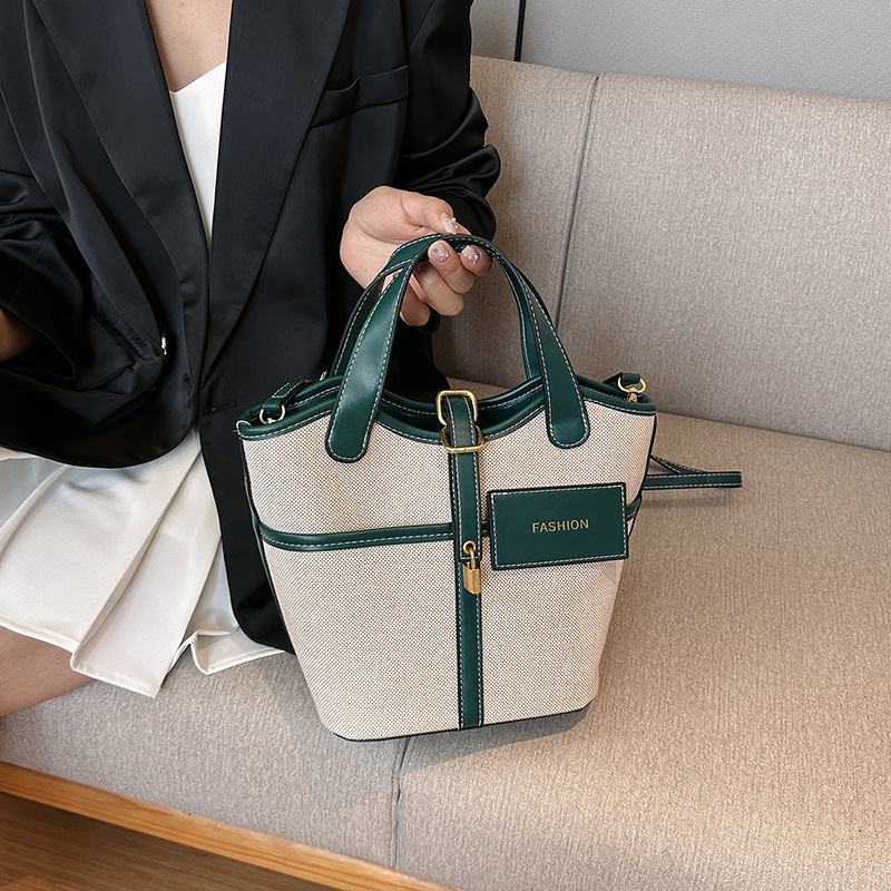 Nicho de diseño retrógrado lienzo portátil bolso de cubo de agua mujer 2026 nuevo cross-border ins canasta de moda bolso de mochila image 3