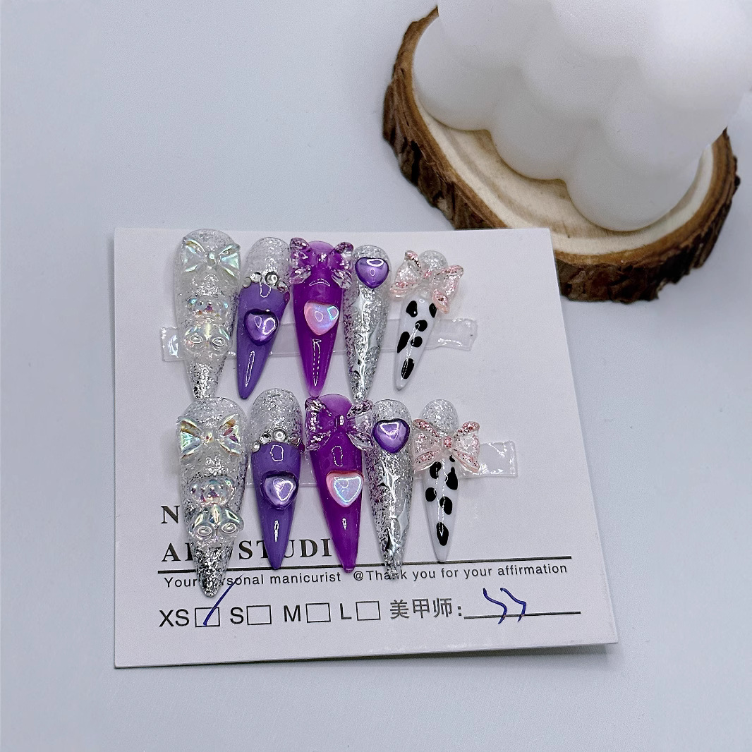 Hecho a mano desgaste de uñas de hielo transparente hidratante Purple Girl corazón japonés dulce uñas parche producto terminado al por mayor