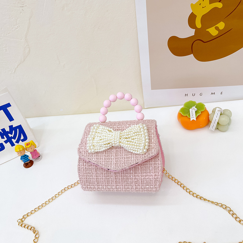 2022 nuevo arco de la celebridad en línea tejida bolso de los niños de las mujeres de estilo coreano lindo crossbody mini bolso de la perla