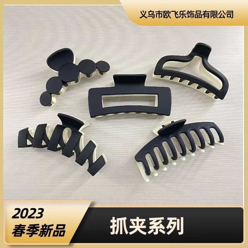 Oufeile superficie de dos colores AB textura esmerilada agarre cuchara trasera femenina alta Cola de Caballo tiburón clip accesorios para el cabello horquilla al por mayor