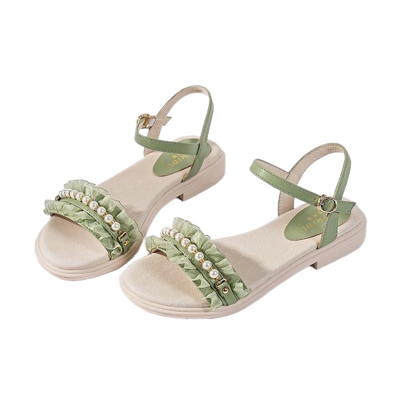 Sandalias de playa de viento de hadas 2025 verano nuevo estilo con falda, estilo de estudiante plano, sandalias de perlas de una sola palabra, mujer