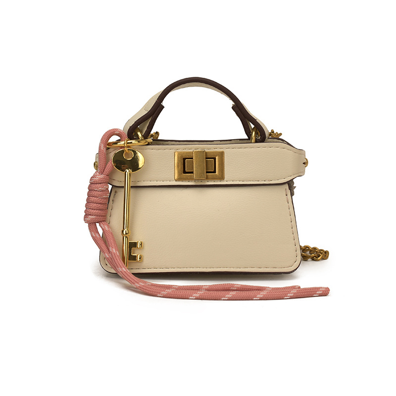 Coreano simple bolso de niña de color sólido mini bolso de bebé 2026 bolso para niños de comercio exterior transfronterizo