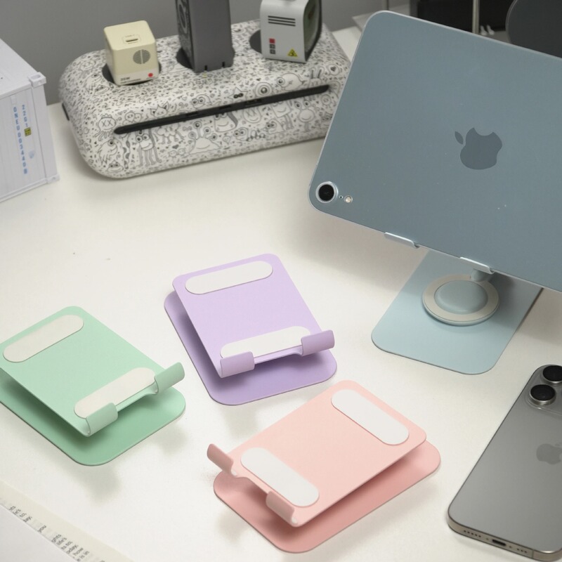 クリエイティブマカロンカラフルな回転携帯電話タブレットホルダー卸売ポータブル折りたたみ怠惰なデスクトップ携帯電話ホルダー|undefined