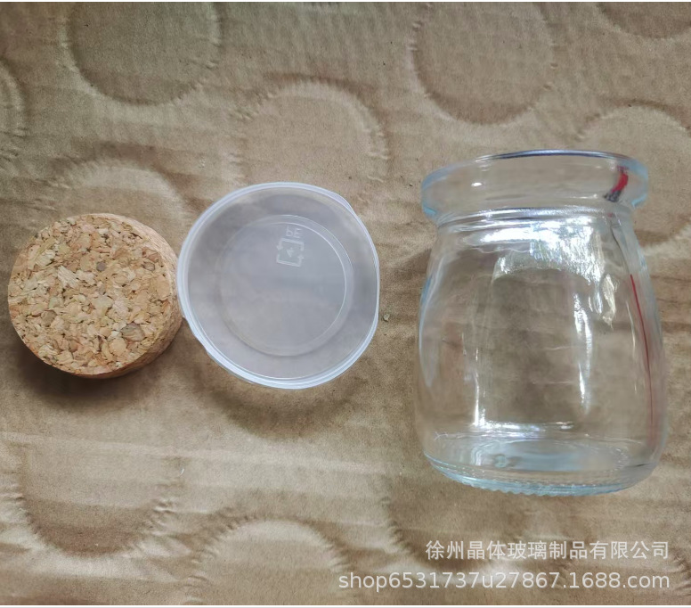 卸売り100mlガラス布丁瓶厚手牛乳カップ耐高温ヨーグルト瓶木栓ガラス瓶許瓶瓶