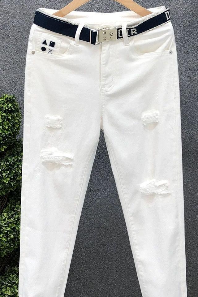 Jeans slim fit uomo denim strappato alla moda per l'estate_voghion.com